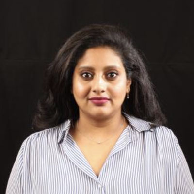 A corporate headshot of Anusha Natarajan